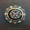 Broche de azabache, plata y oro